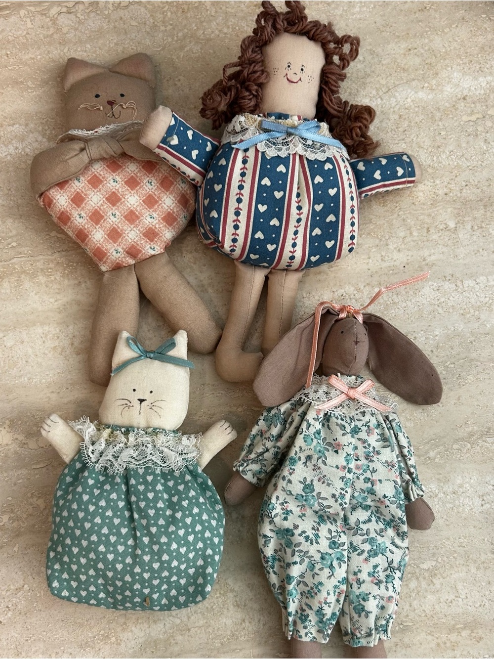 4 vintage handmade cloth cat rabbit and girl dolls with different patterns